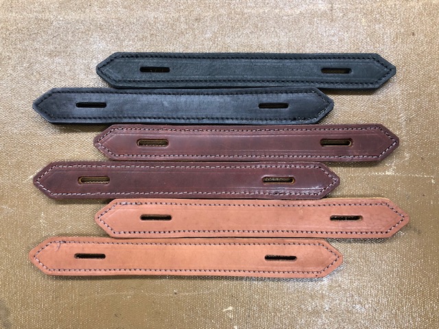 Stitched leather trunk handles
